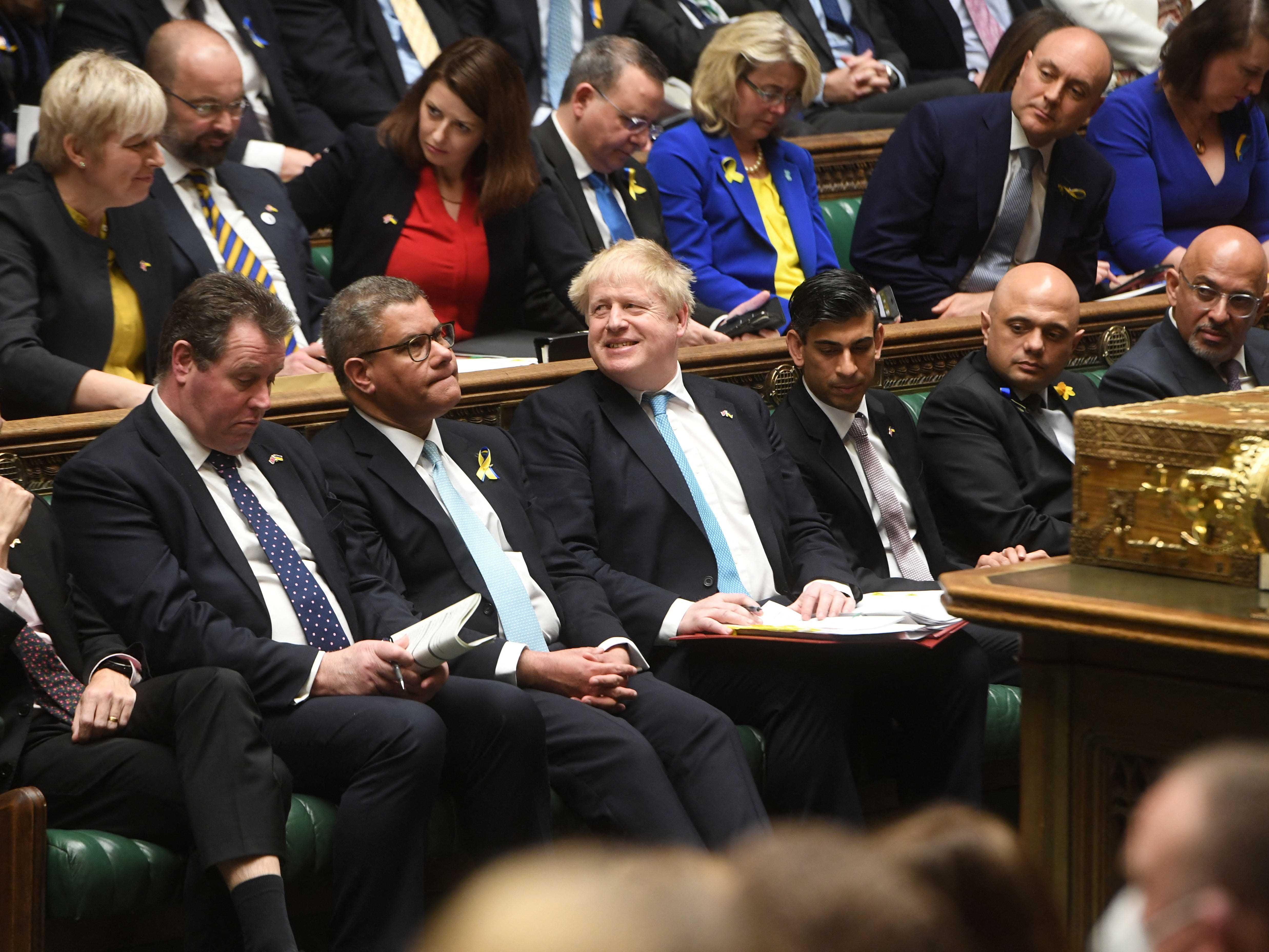 Der britische Premierminister Boris Johnson reagiert während einer PMQs-Sitzung im Unterhaus