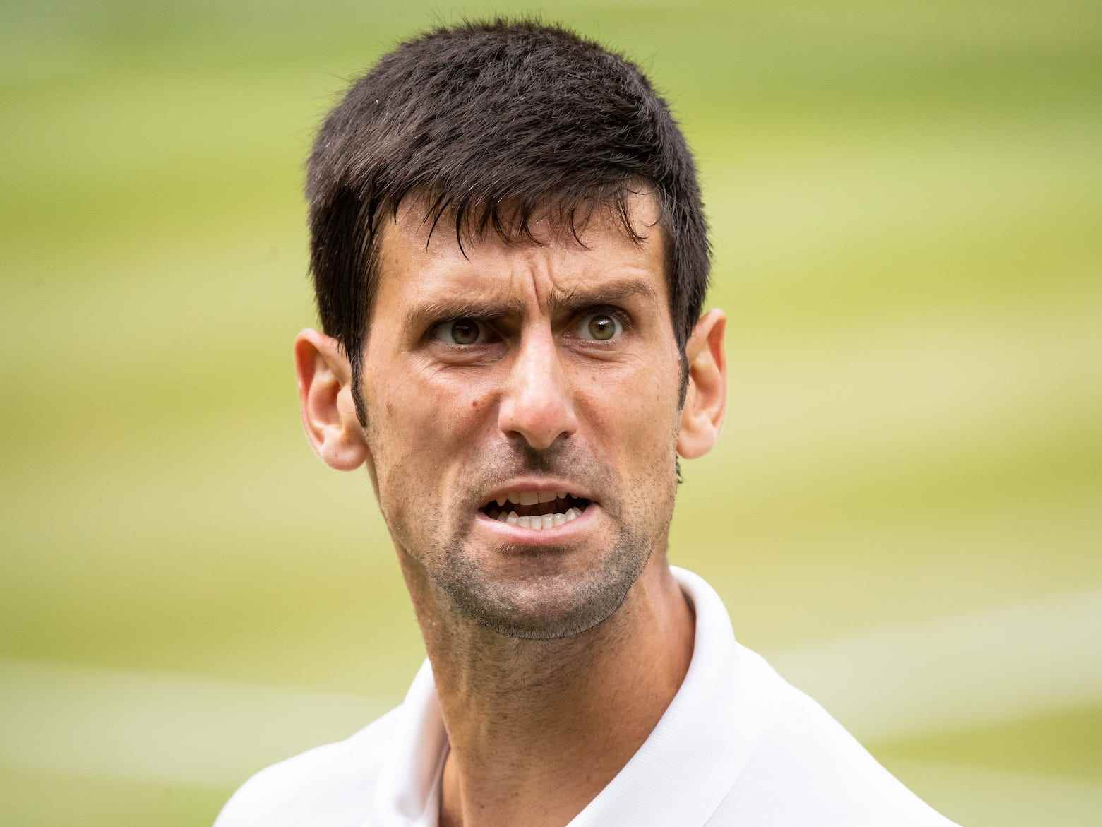 Novak Djokovic aus Serbien reagiert während seines Spiels gegen Rafael Nadal aus Spanien während der Wibledon Lawn Tennis Championship im All England Lawn Tennis and Croquet Club in Wimbledon.