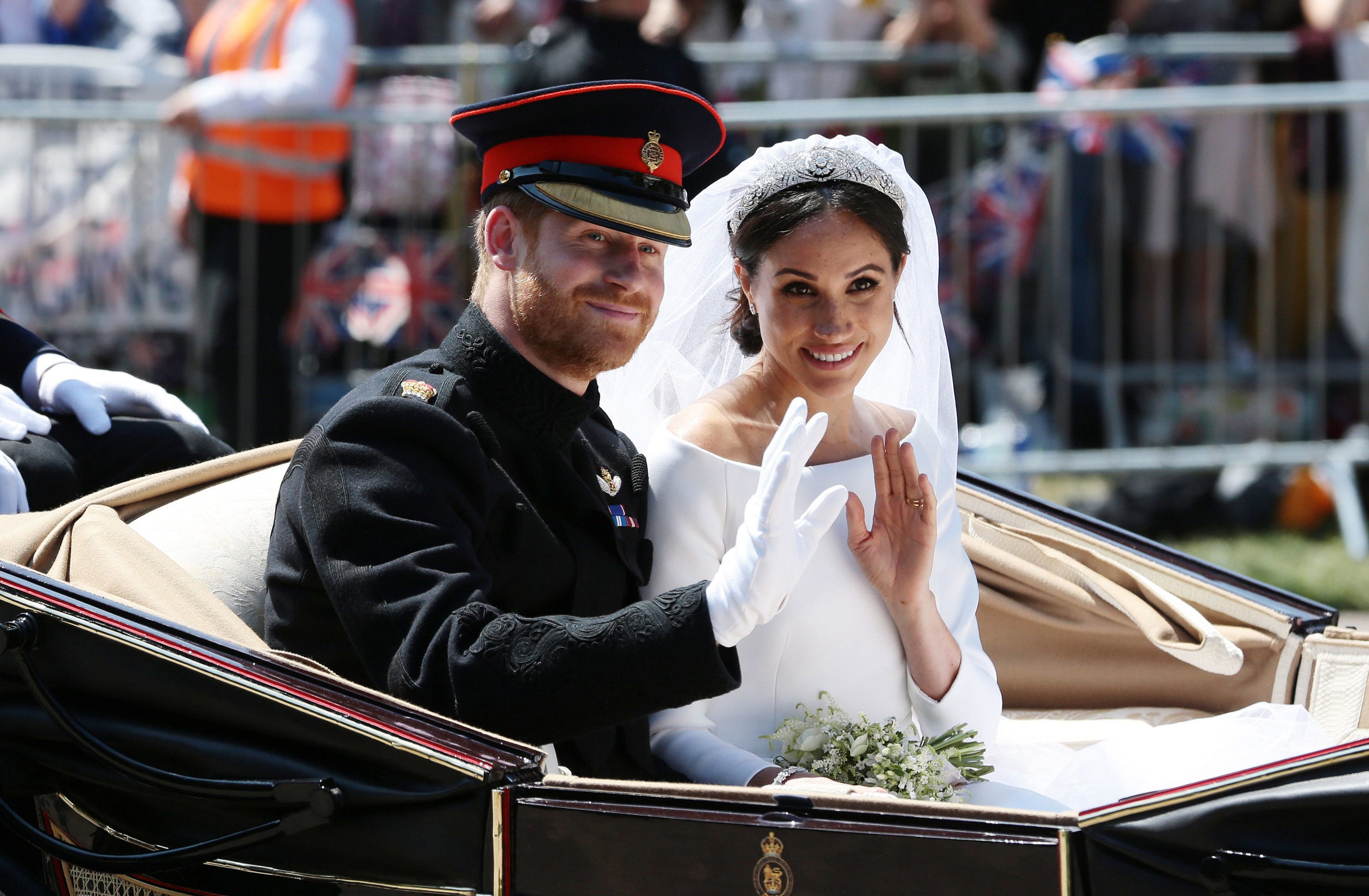 Meghan Markle und Prinz Harry in ihrer Hochzeitskutsche