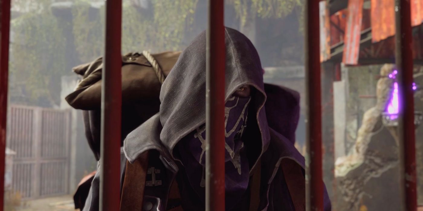 Der Händler in der RE4-Neuverfilmung schaut durch die Gitterstäbe eines Tors, als er Leon zum ersten Mal trifft.