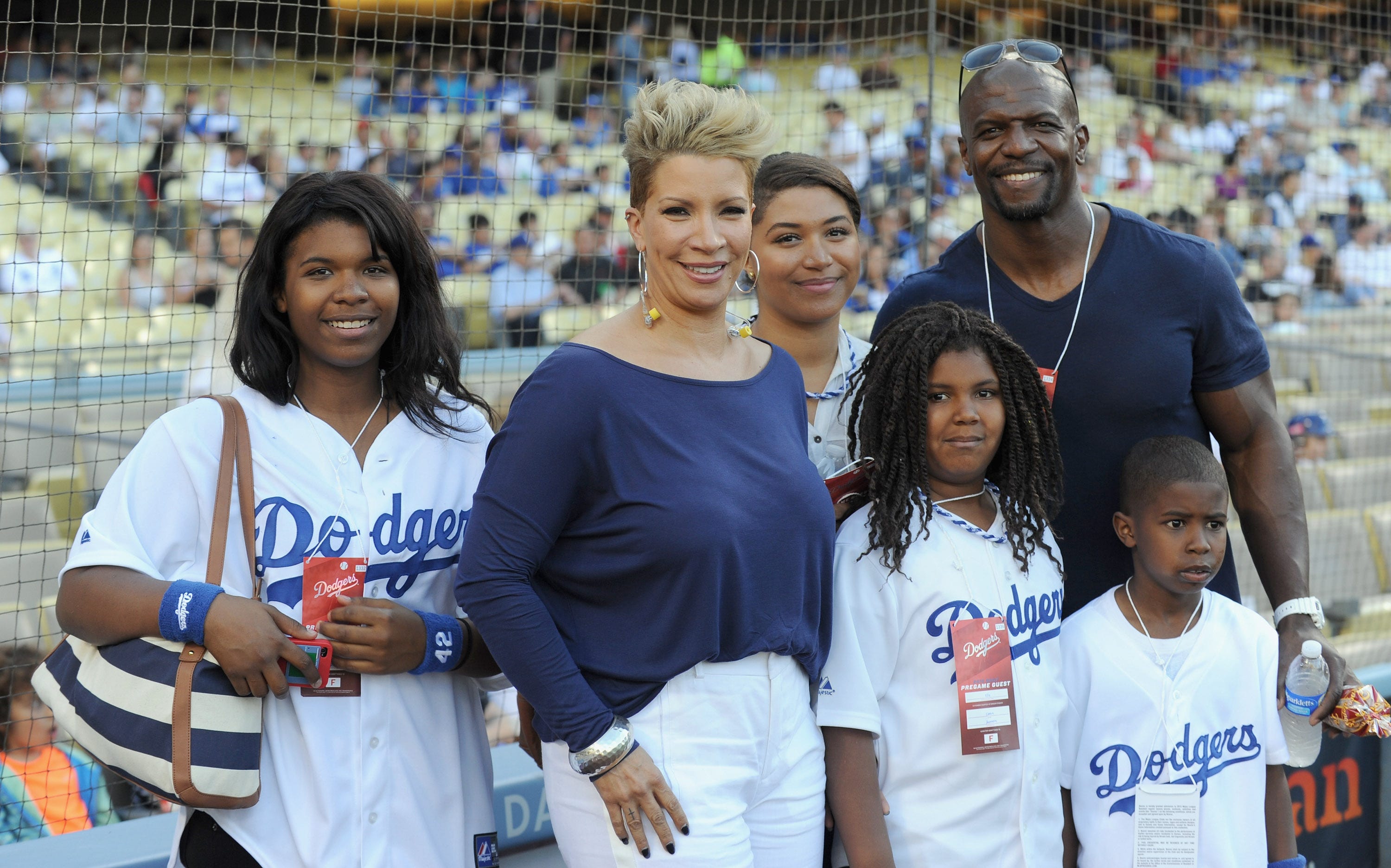 Terry Crews und Frau Rebecca King mit vier ihrer fünf Kinder im Dodger Stadium in Los Angeles im Jahr 2013.