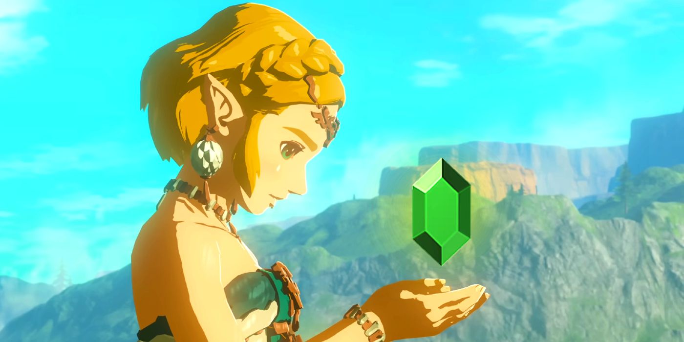 Prinzessin Zelda aus Tears Of The Kingdom hält eine leuchtende Rupie hoch.