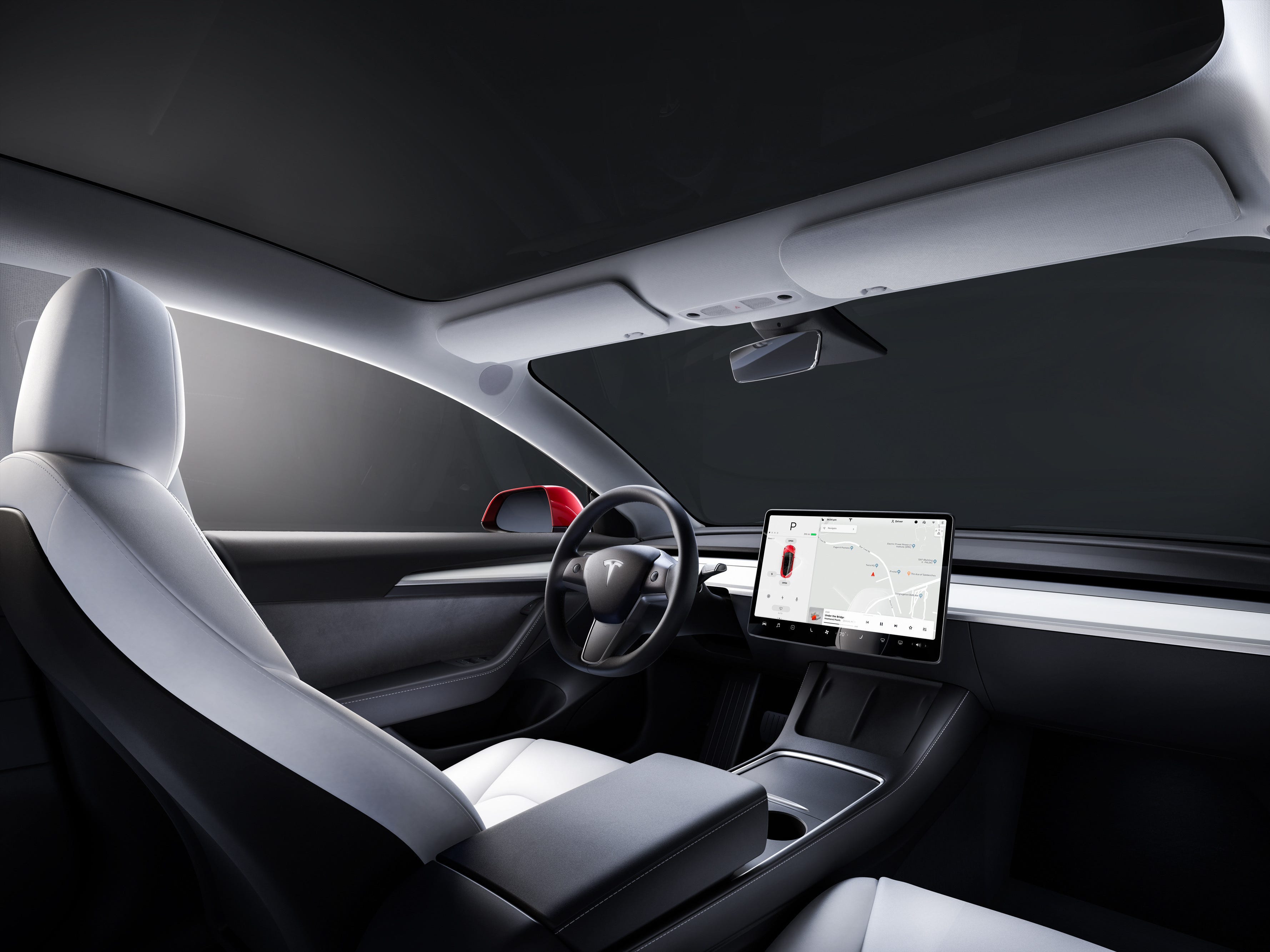 Innenraum des vorderen Armaturenbretts des Tesla Model 3.