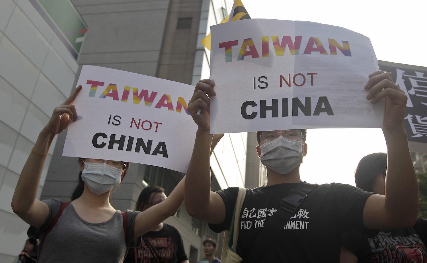 Demonstranten in China und Taiwan