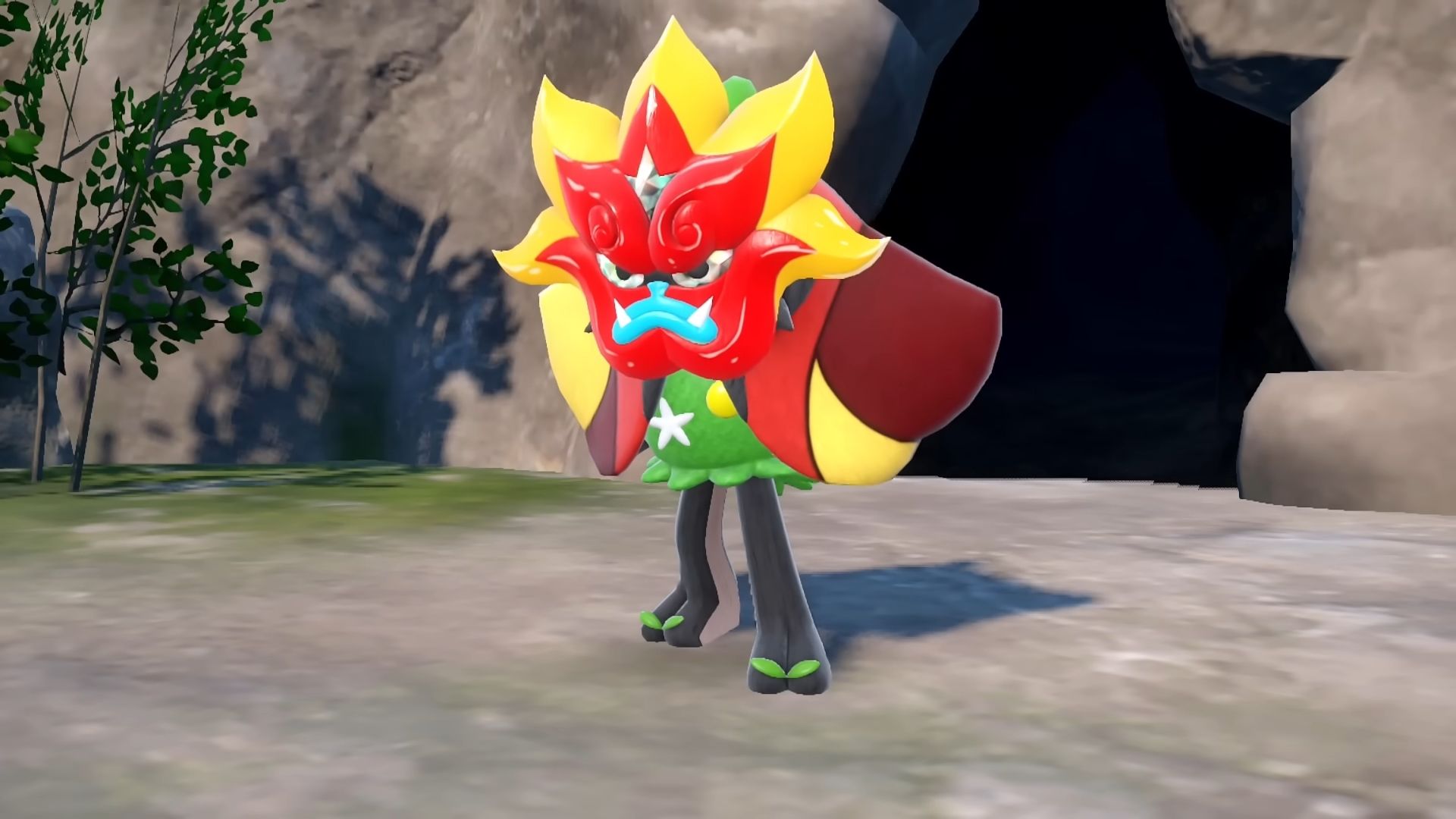 Ogerpon aus Pokémon Scarlet und Violet trägt eine rot-gelbe Maske.