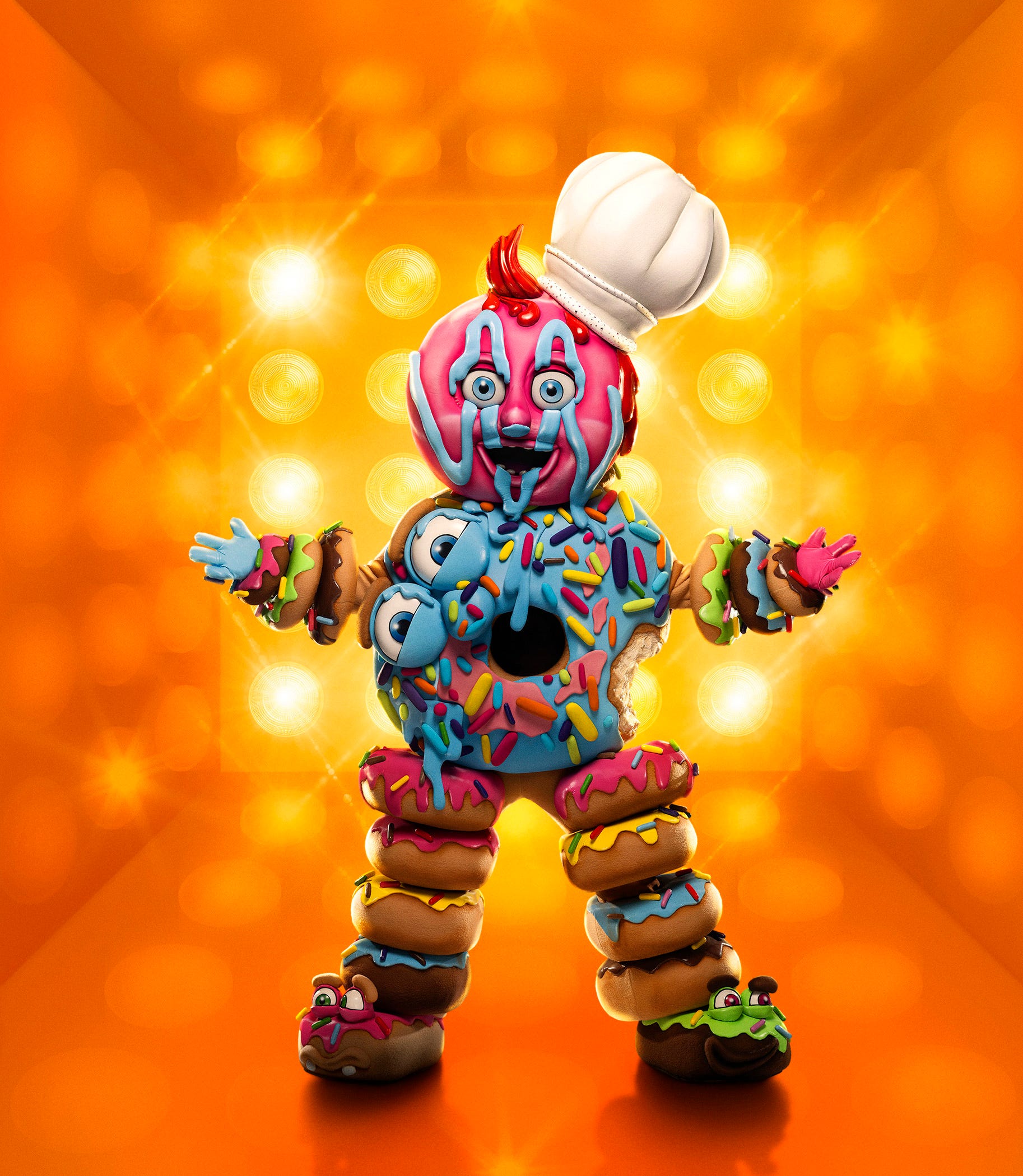 Person im Donut-Kostüm in Staffel 10 von „The Masked Singer“.