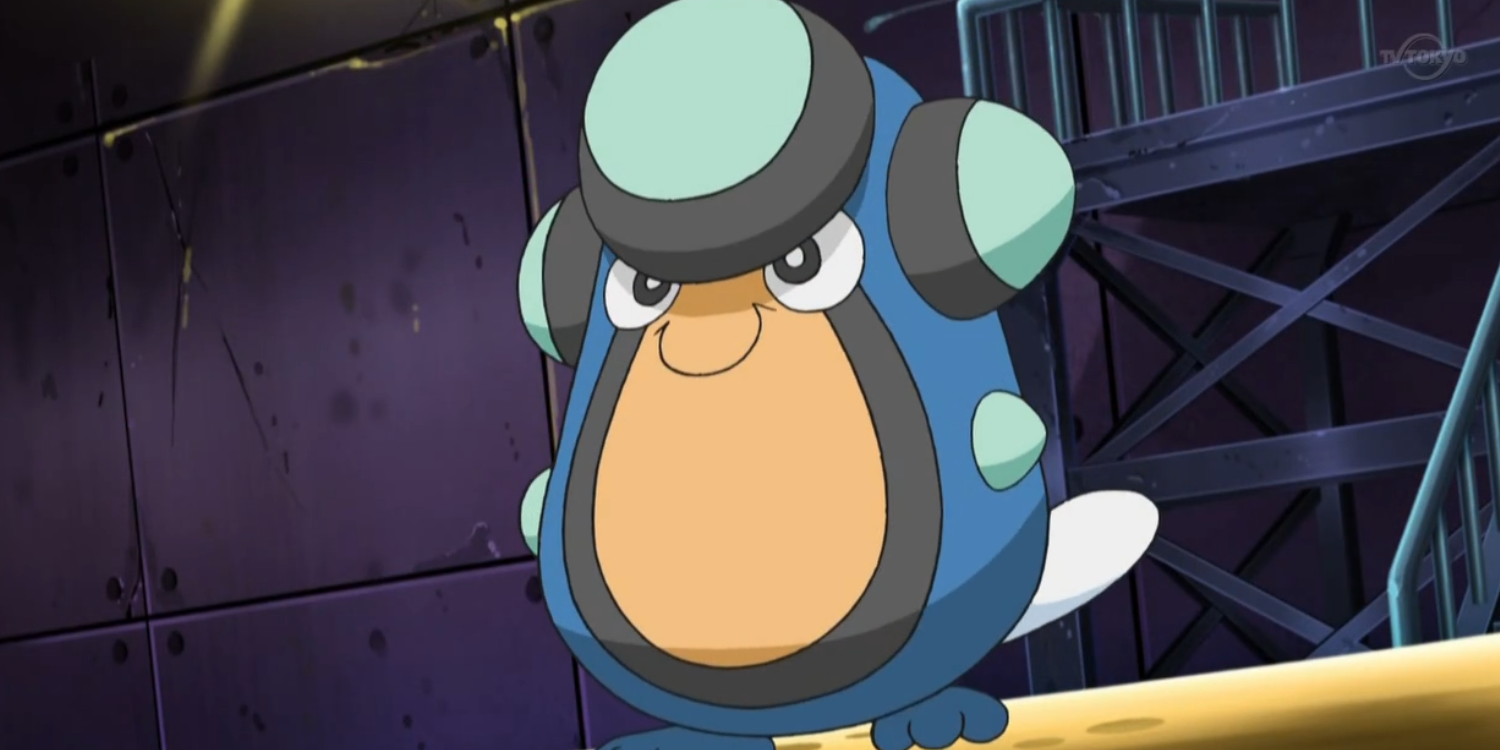 Palpitoad lächelt und steht in der Arena eines Fitnessstudios in der Pokémon-Anime-Serie