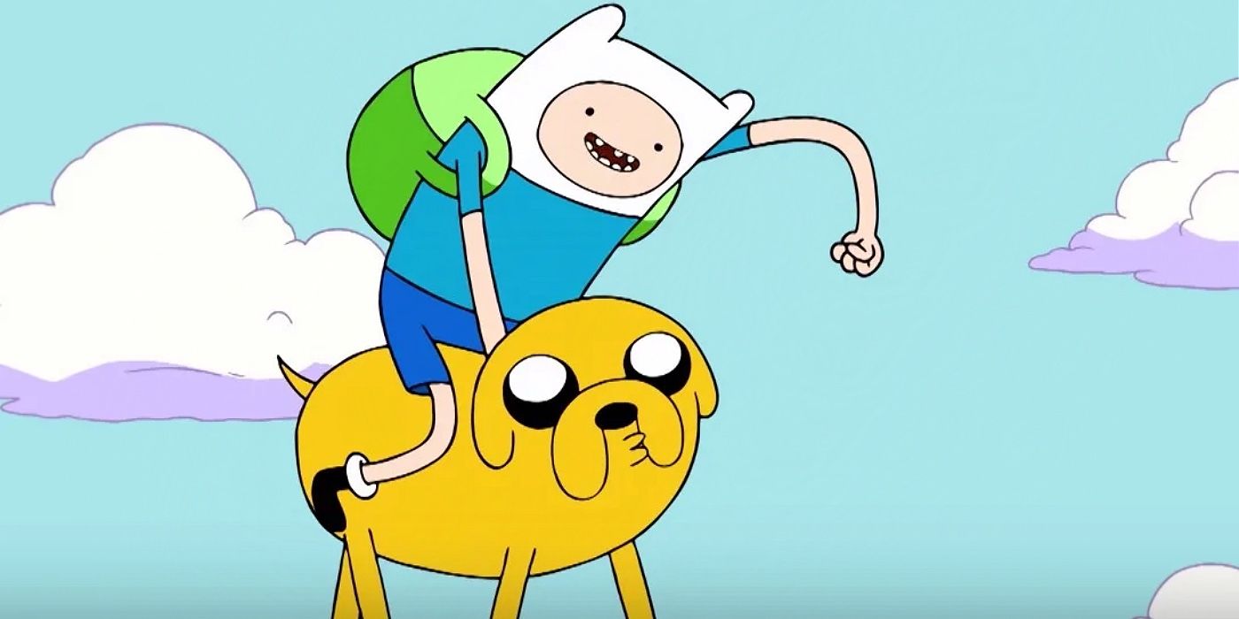 Finn reitet in Adventure Time auf Jakes Rücken.
