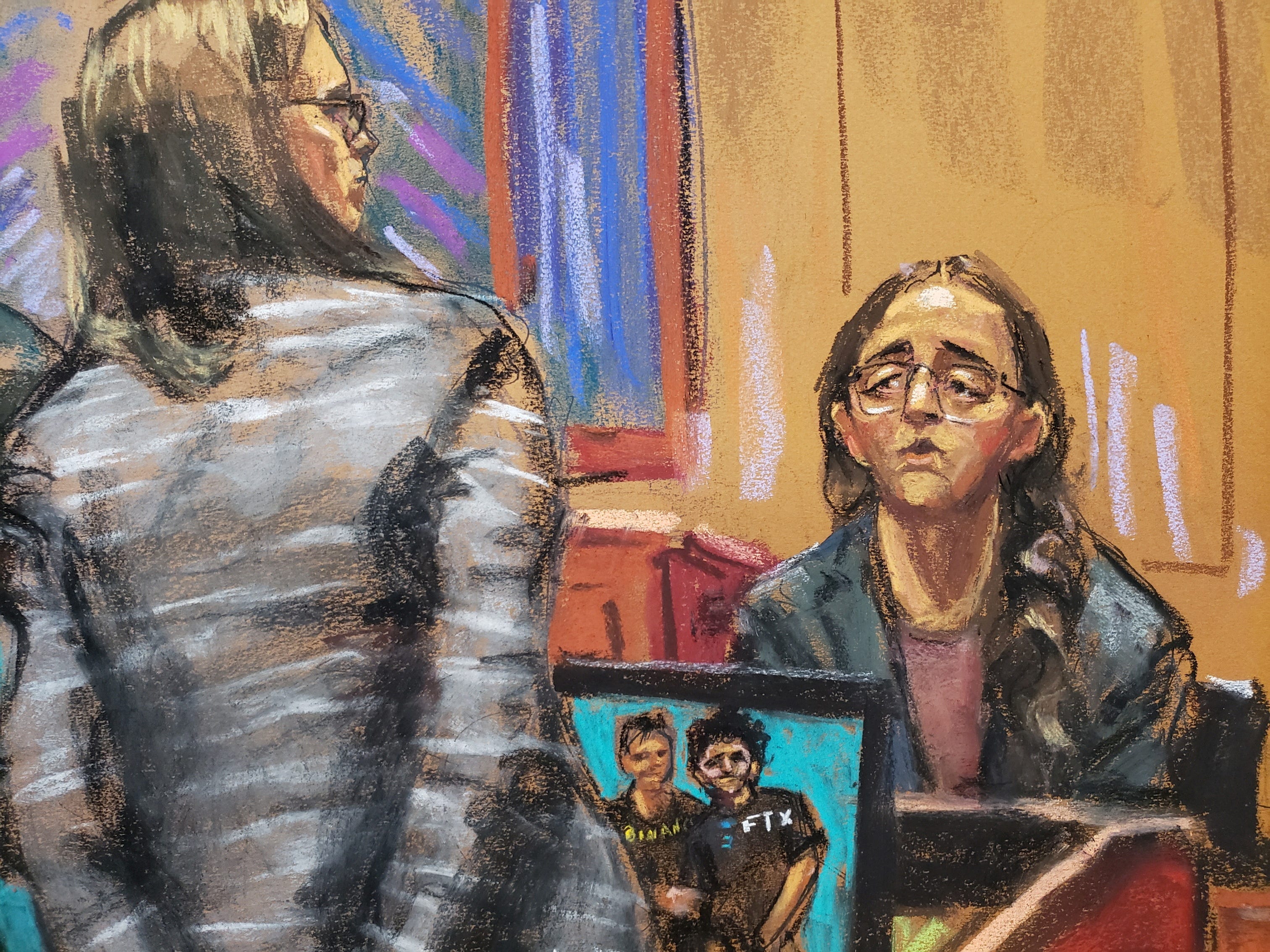 Porträt von Caroline Ellison, die vor Gericht sitzt.