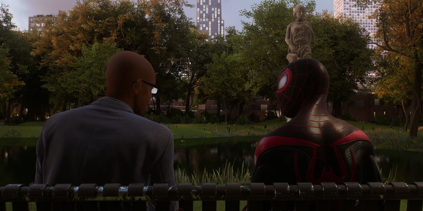 Miles und Opa Earl sitzen in der Nebenmission „Find Grandpa“ von Spider-Man 2 auf einer Parkbank mit Blick auf einen See