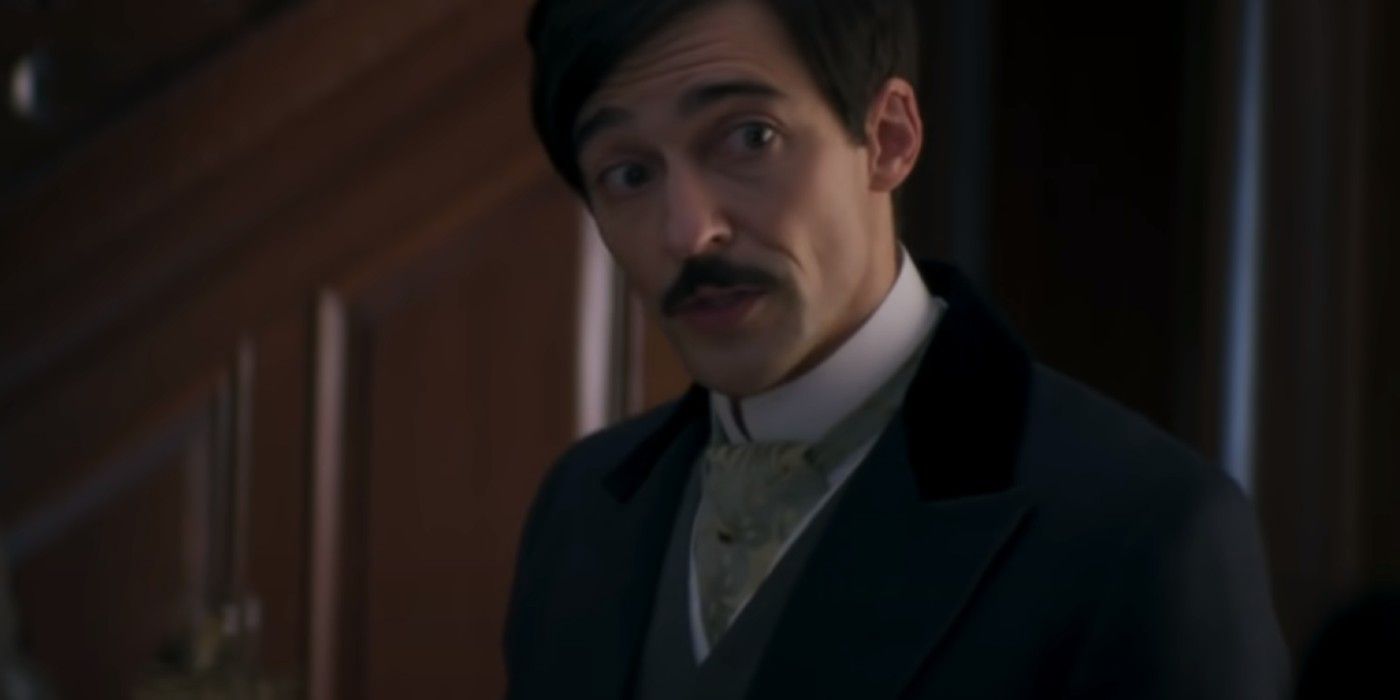 Oscar mit Schnurrbart und Anzug in „The Gilded Age“.
