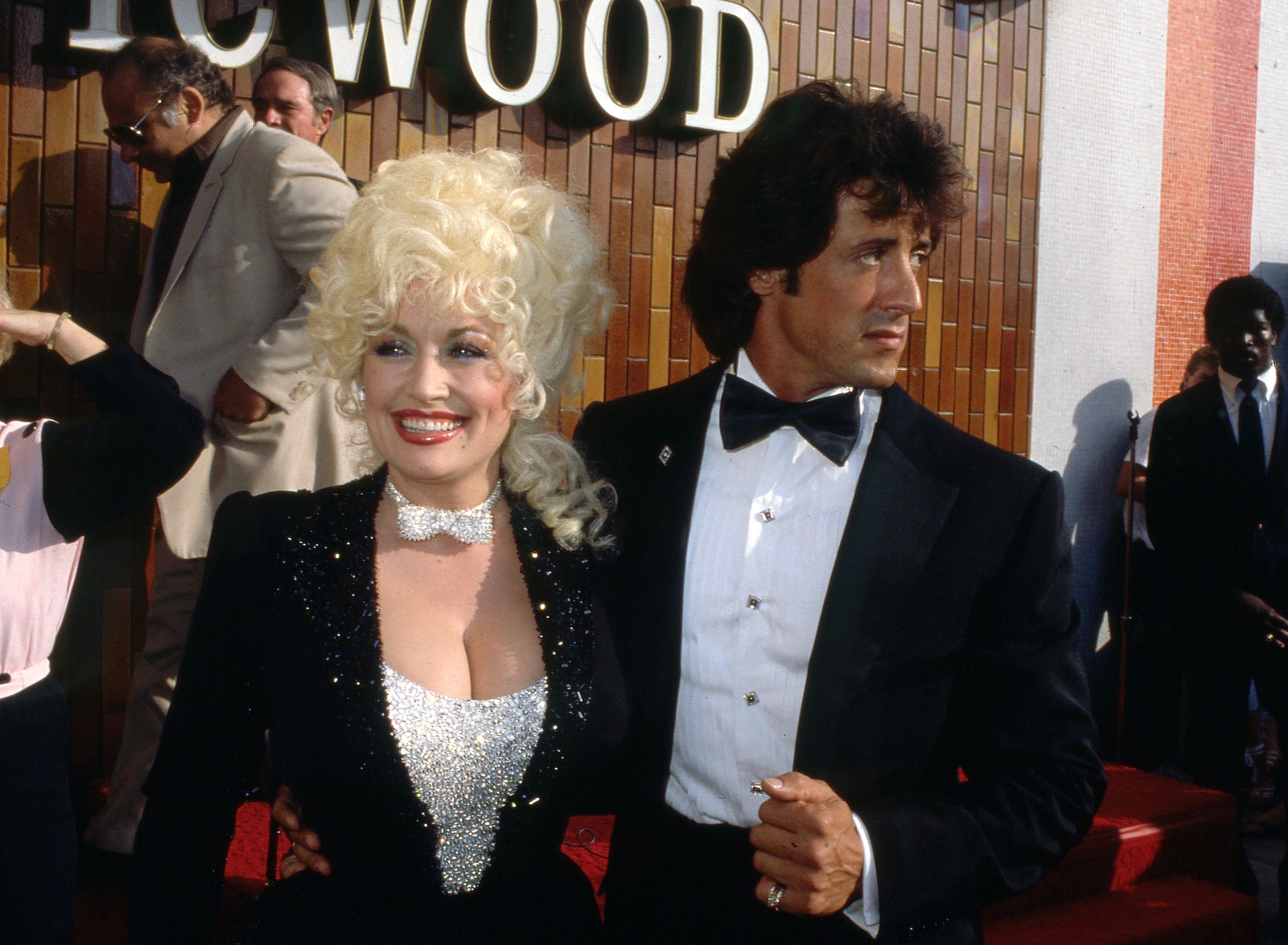 Sylvester Stallone und Dolly Parton bei der „Rhinestone“-Premiere 1984.