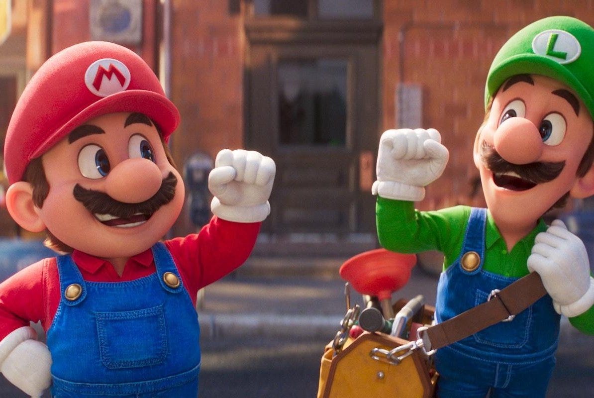 Mario und Luigi halten ihre Fäuste hoch