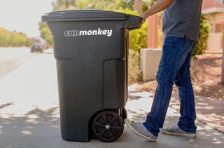 Ein Mülleimer mit Can Monkey-Logo