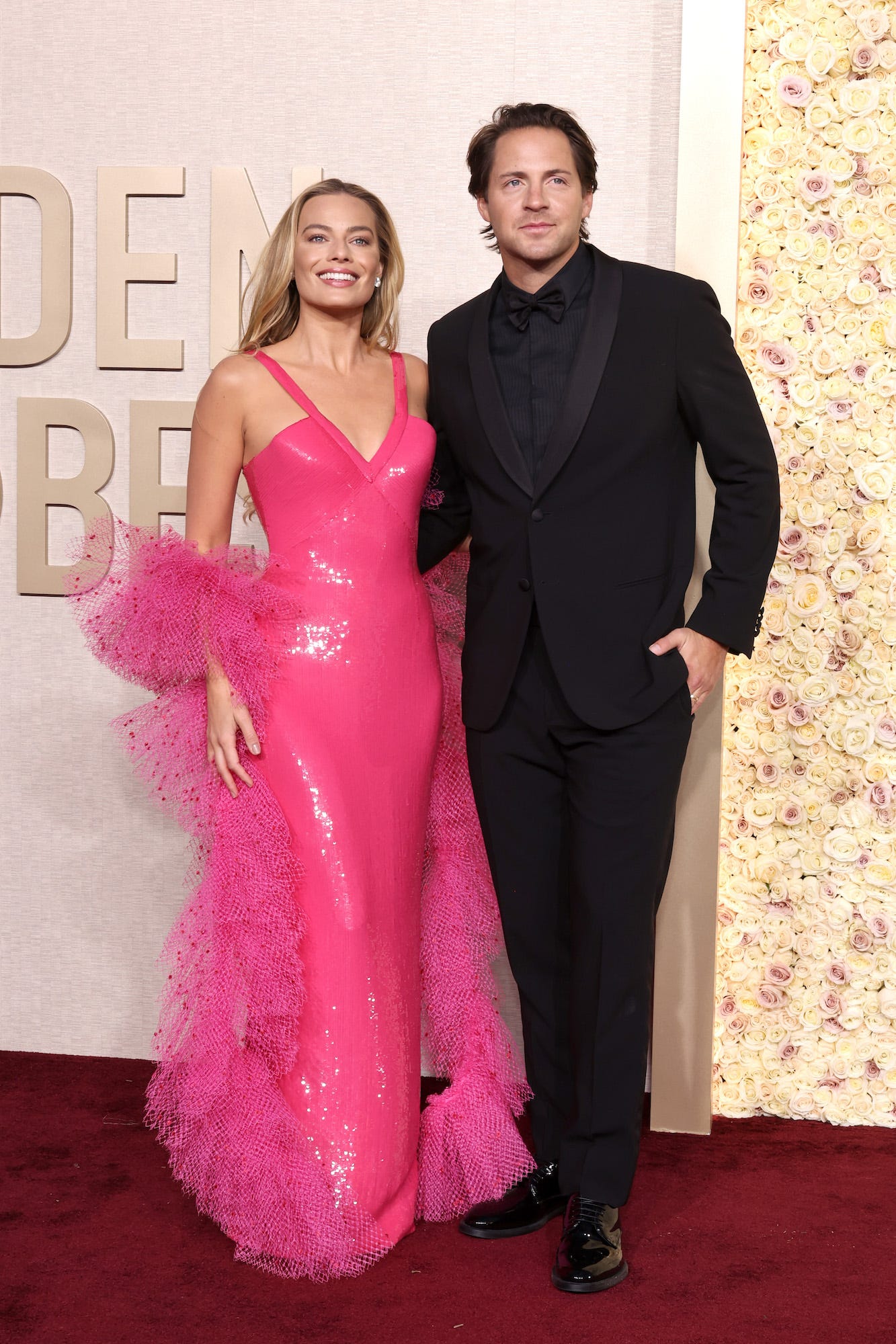 Margot Robbie und Tom Ackerley nehmen an den Golden Globes 2024 teil.