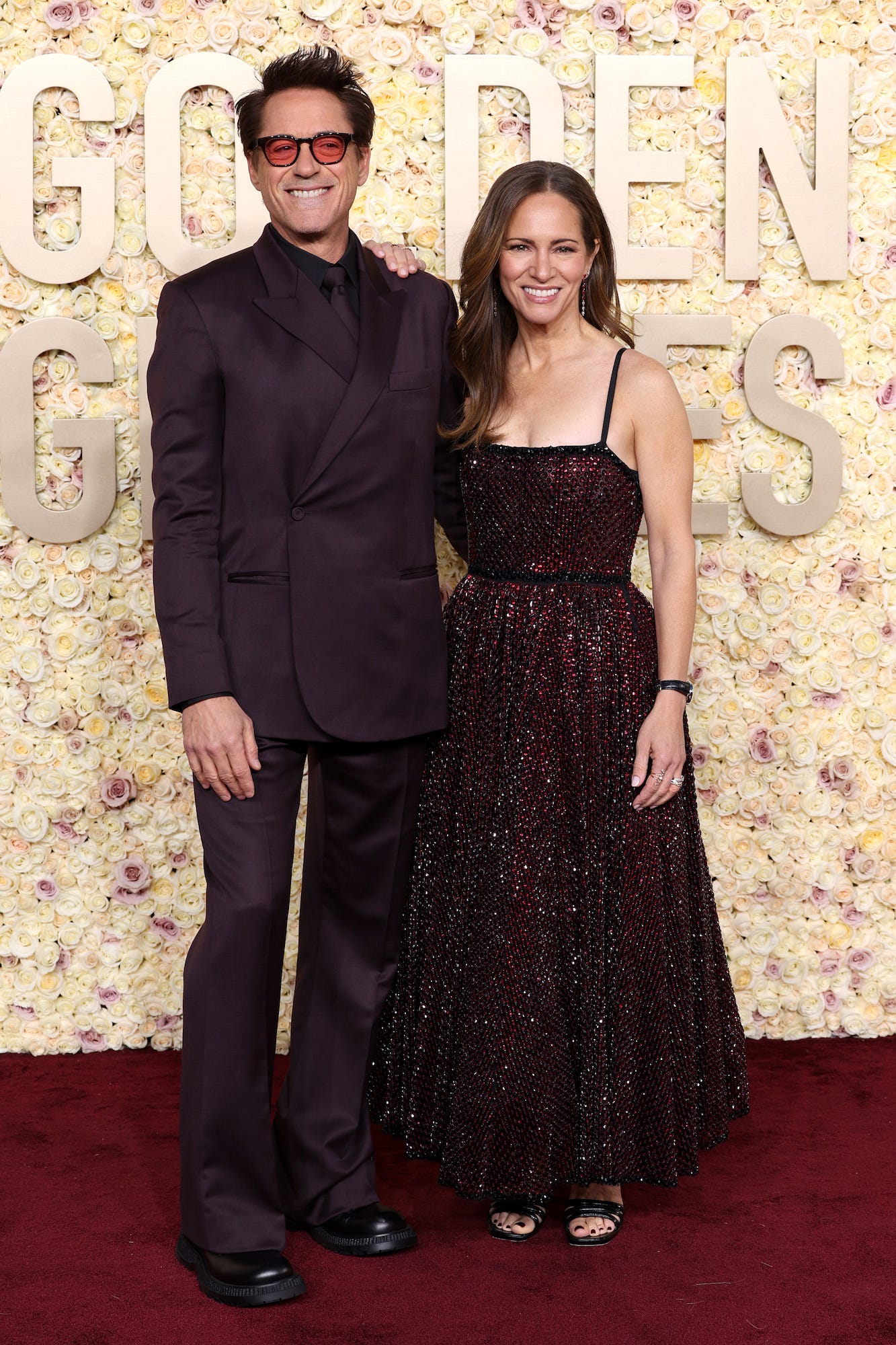 Robert Downey Jr. und Susan Downey nehmen an den Golden Globes 2024 teil.