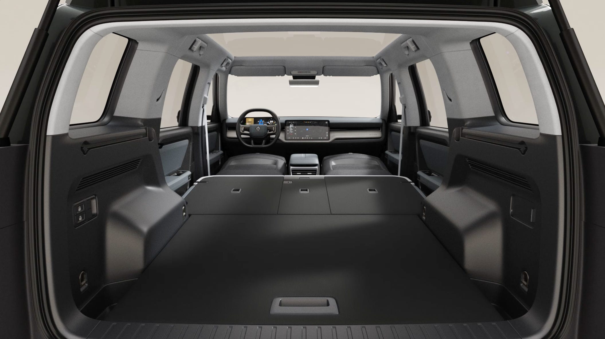 Der Innenraum des SUV R2 mit umgeklappten Sitzen.