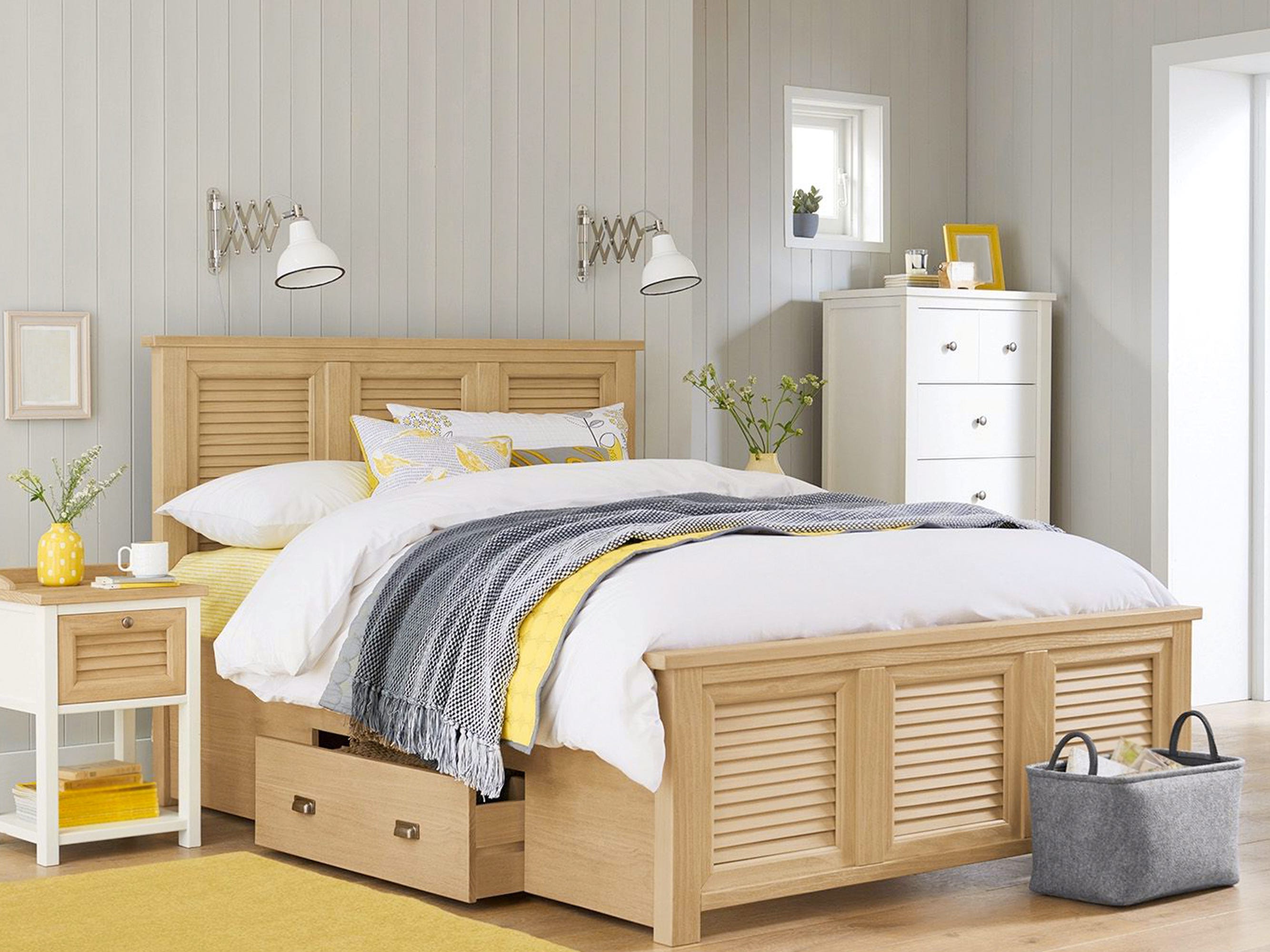 Helles, modernes Schlafzimmer mit gelben und grauen Designelementen