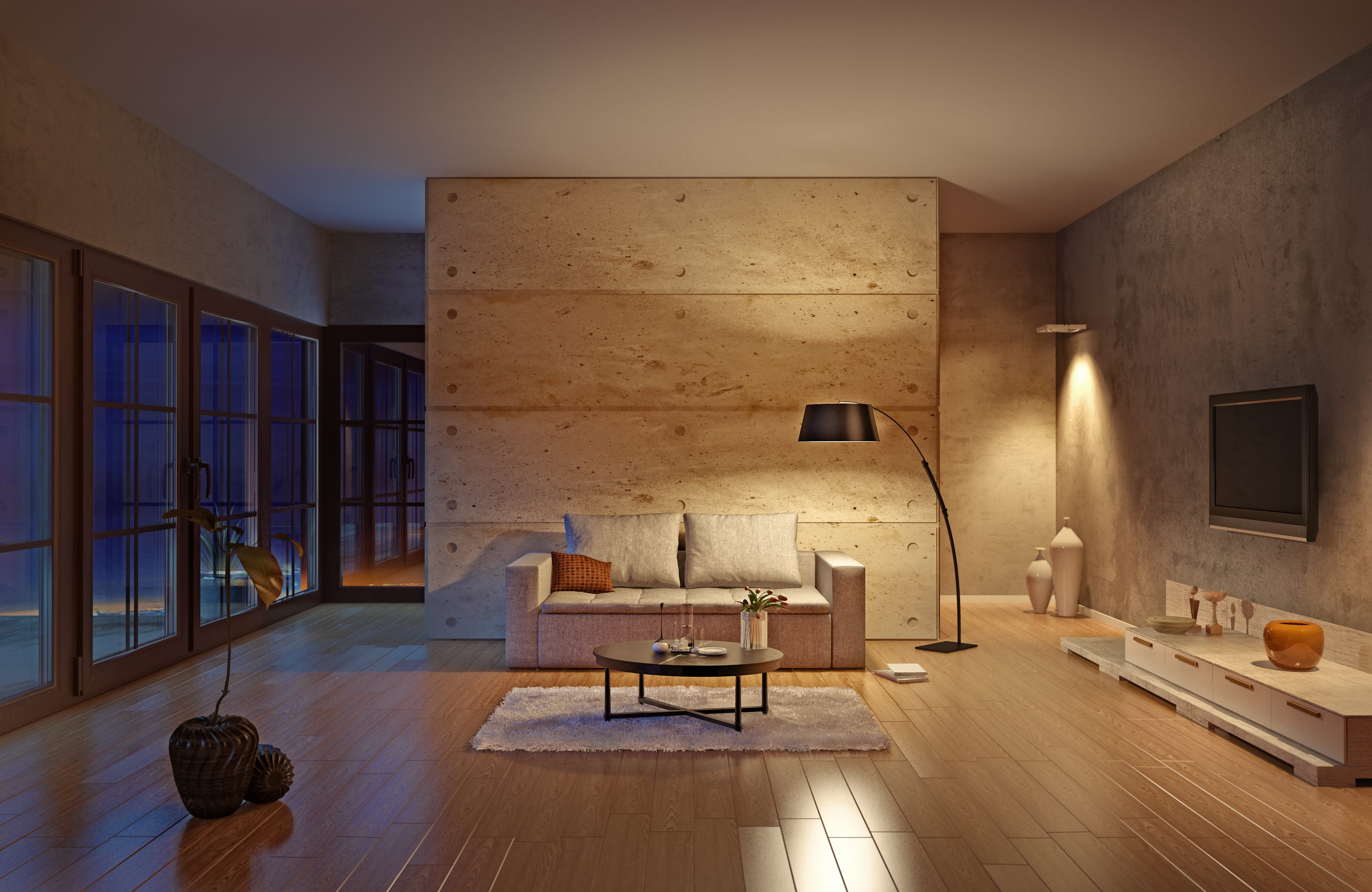 Wohnzimmer mit kleiner Couch, Lichter, die auf Möbel und Wand scheinen