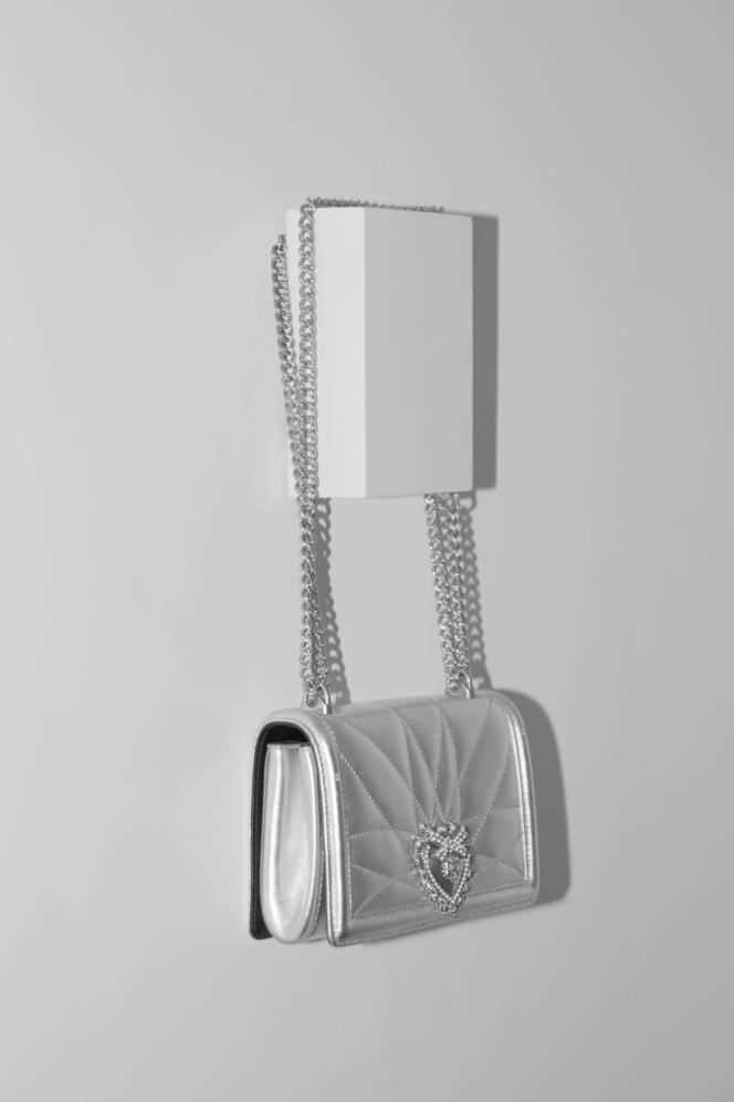 Devotion bag, in lamé calfskin, with metal buckle, Dolce & Gabbana, price on request.  dolcegabbana.com