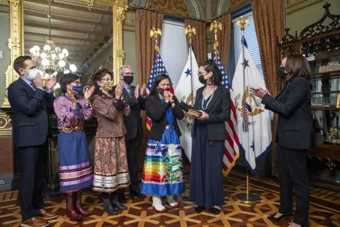 Home Secretary Deb Haaland (center) taking his oath of office at the White House on March 18, 2021.