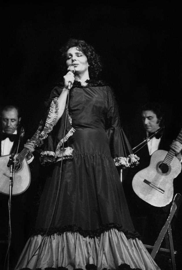 Portuguese fado singer Amália Rodrigues at the Paris Olympia in 1975.