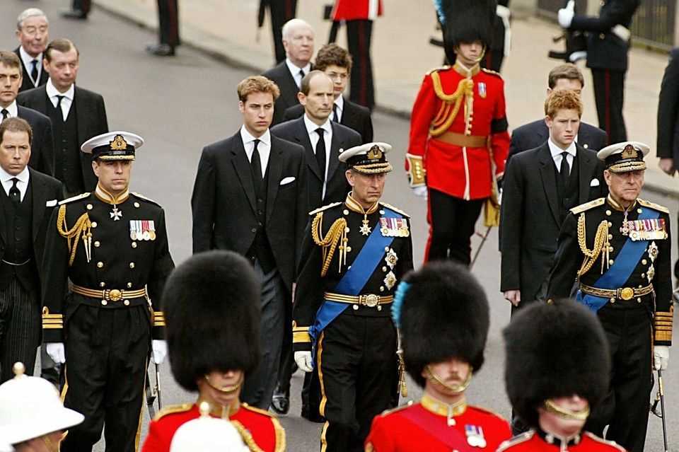 Prince William and Prince Harry (second row) pay their respects to their late great-grandmother Queen Mum. 
