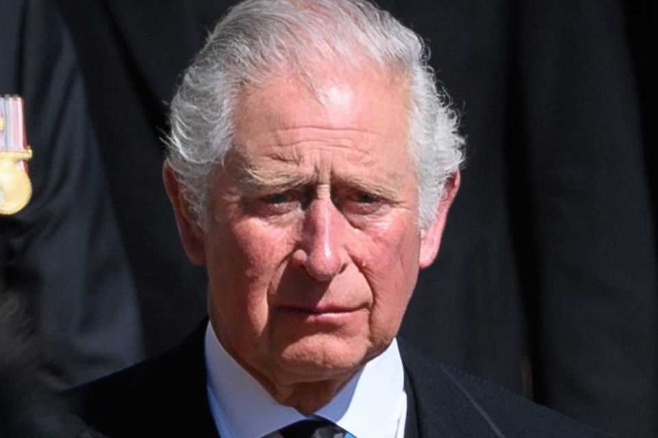 Prince Charles weeps for his father.
