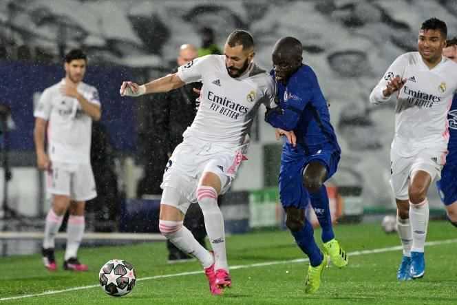 Chelsea midfielder N'Golo Kante challenges Real Madrid forward Karim Benzema in the semi-final of the Football Champions League at the Alfredo di Stefano stadium in Valdebebas, on the outskirts of Madrid, on 27 April.