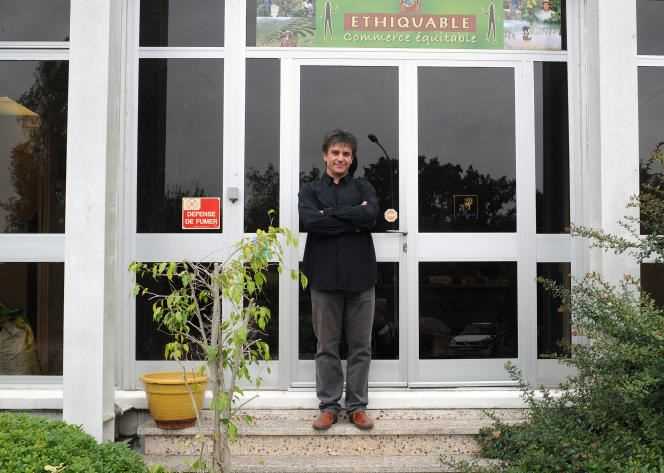 The manager of the company Ethiquable, Gérard Roux, poses in front of the entrance of the company, in Fleurance (Gers), on October 13, 2008.