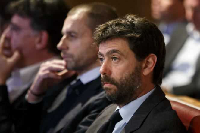 UEFA President Aleksander Ceferin, center, and European Club Association, ECA President, Italy's Andrea Agnelli, right, watch the Champions League round of 16 draw 2018/19, at UEFA headquarters in Nyon, Switzerland, Monday 17 December 2018.