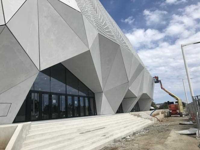 In front of the Cineum multiplex (designed by Rudy Ricciotti), under construction, in Cannes, April 19, 2021.