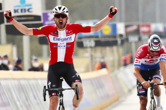 Kasper Asgreen wins the Tour of Flanders by beating Mathieu van der Poel in the sprint on April 4.