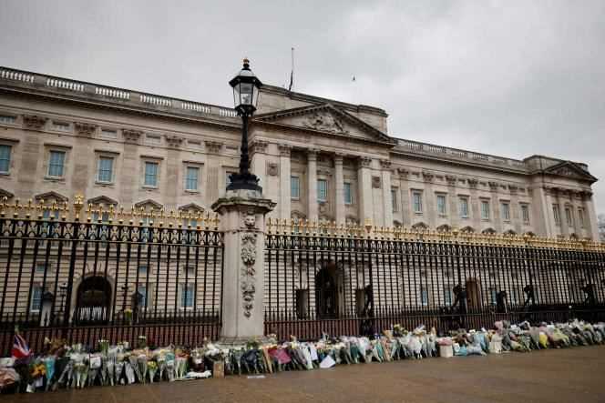 Flowers in tribute to Prince Philip, Duke of Edinburgh, are laid outside Buckingham Palace in London on April 10, 2021, the day after his death at the age of 99.