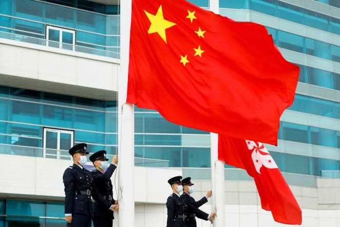 Chinese and Hong Kong flag raising ceremony, on Golden Bauhinia Square, Hong Kong, March 11, 2021.