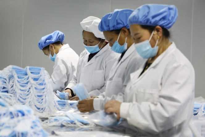 At a medical protective equipment production plant in Jishou (central China) on January 28, 2021.
