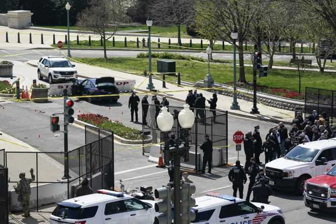 Capitol Police officers near the car that drove into a Senate checkpoint at the Capitol in Washington, DC on April 2.