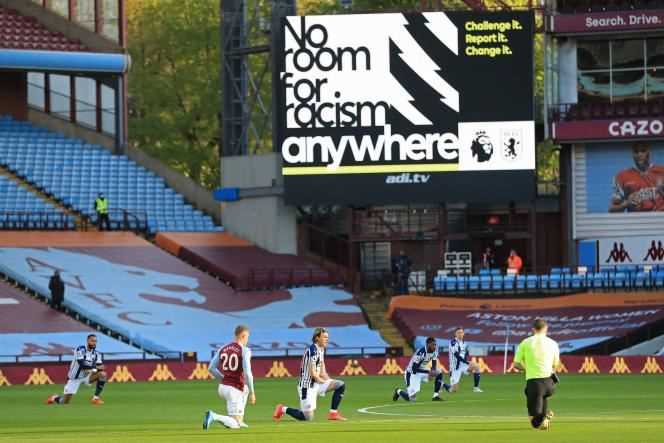 Players kneel in support of the 'No Room For Racism' campaign ahead of the Aston Villa v West Bromwich Albion game at Villa Park in Birmingham on April 25.