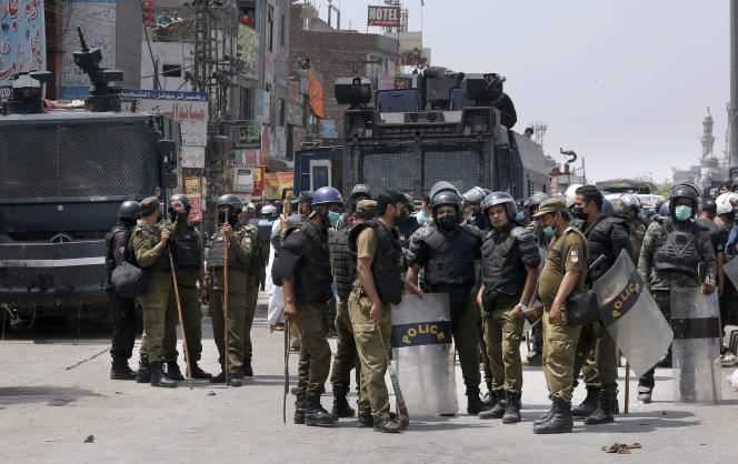 Police officers mobilized during anti-French demonstrations in Lahore, Pakistan, Sunday April 18.