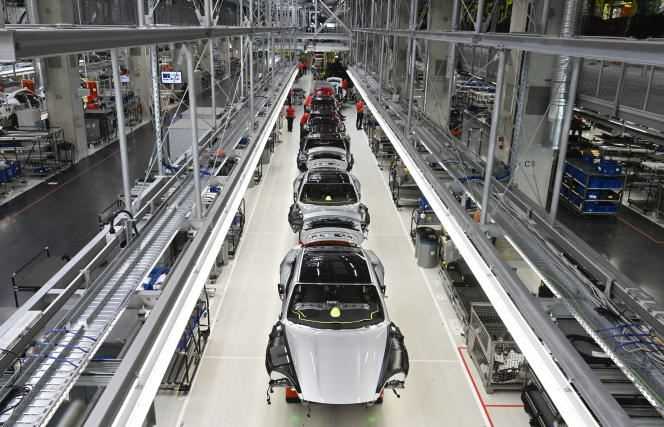 Fully electric Taycan models lined up at Porsche's production site in Stuttgart (Germany) in May 2020.