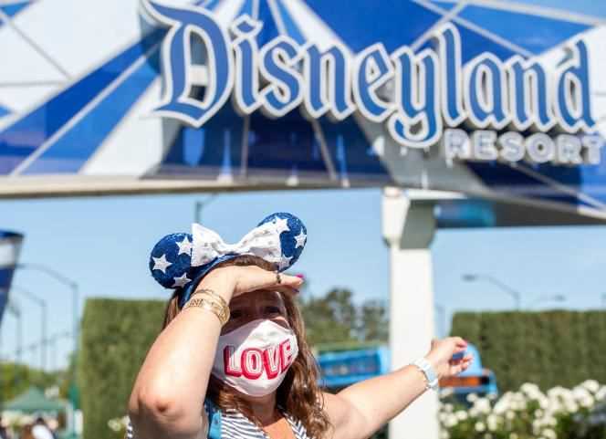 A visitor to the Disneyland theme park on the first day of opening since March 2020, April 30, in Anaheim, California.