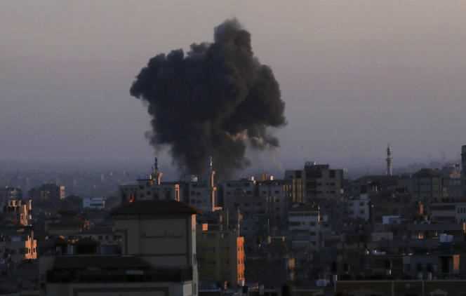 Plumes of smoke after an airstrike on Gaza City on May 13, 2021.