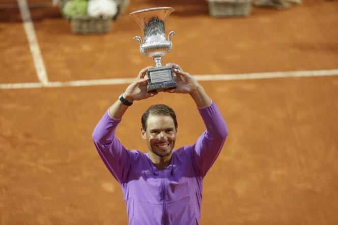 Rafael Nadal lifts his tenth trophy on the clay court in Rome on May 16, 2021.