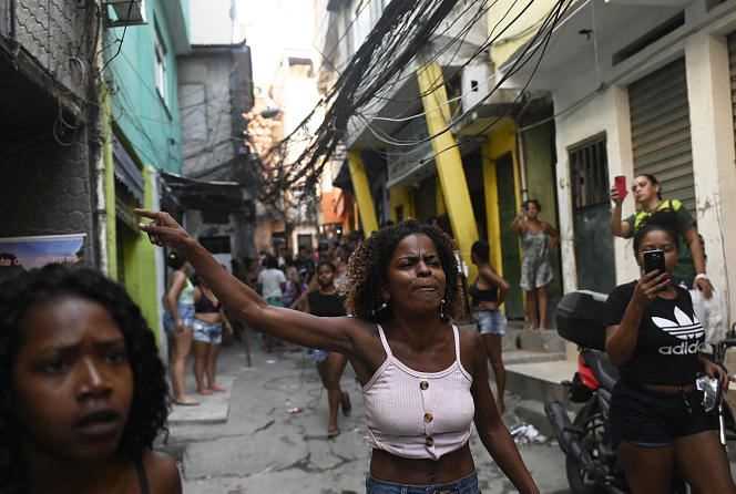 Residents protest after a police operation against suspected drug traffickers in the Jacarezinho favela in Rio de Janeiro on May 6, 2021.