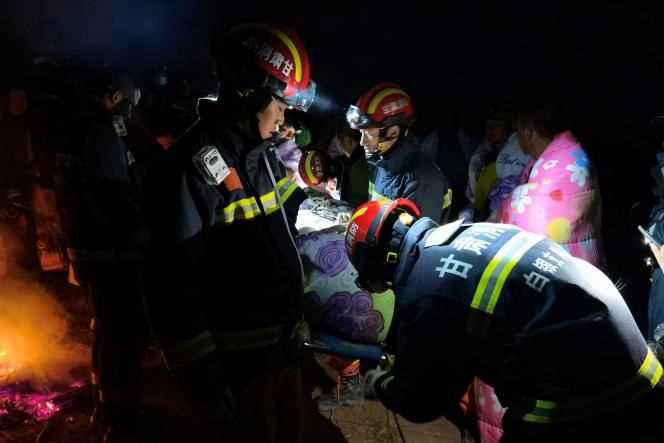 Rescuers are assisting people affected by the weather, near Baiyin, in China's Gansu province, May 22, 2021.