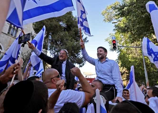 Far-right Israeli lawmakers Bezalel Smotrich (right) and Itamar Ben-Gvir at the “flag march” near the Old City of Jerusalem on June 15, 2021.