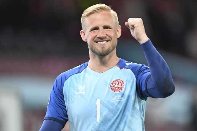 Danish goalkeeper Kasper Schmeichel is smiling after Denmark's qualification for the knockout stages.