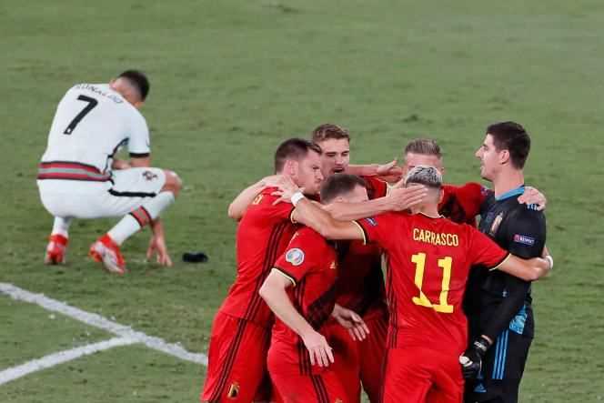 Belgium celebrates its victory against Portugal in the round of 16 of the Euro, on June 27, 2021 in Seville.