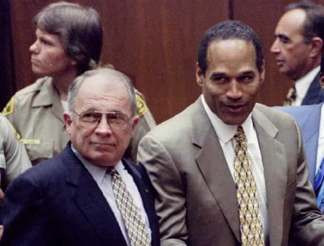 Francis Lee Bailey (left) alongside OJ Simpson on October 3, 1995, as the court announces the acquittal of American football's former glory.