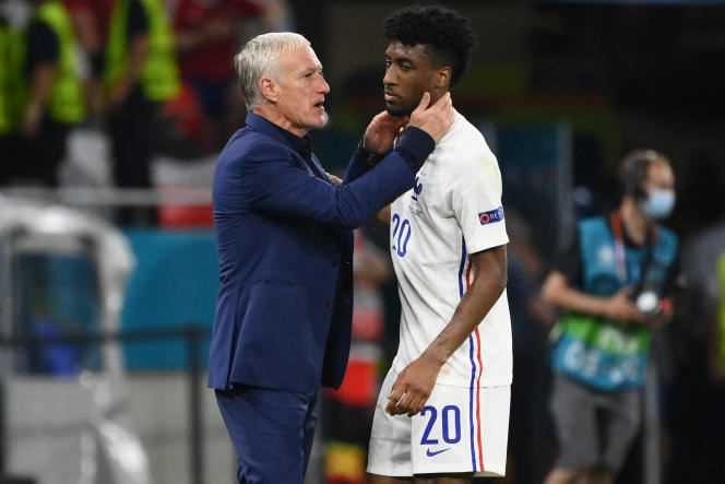 Didier Deschamps encourages his striker Kingsley Coman during the Portugal-France match in Budapest on June 23, 2021.